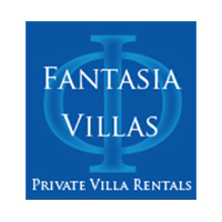 A blue square with the words fantasia villas in white.